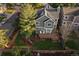 Aerial view showing house, deck, and backyard playground at 7291 Palisade Dr, Highlands Ranch, CO 80130