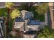House with solar panels on the roof and a deck at 7291 Palisade Dr, Highlands Ranch, CO 80130