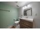Clean basement bathroom with a modern vanity and shower at 7291 Palisade Dr, Highlands Ranch, CO 80130