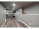 Finished basement area with neutral walls and vinyl flooring at 7291 Palisade Dr, Highlands Ranch, CO 80130