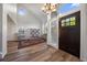 Living room with hardwood floors, vaulted ceilings, and ample natural light at 7291 Palisade Dr, Highlands Ranch, CO 80130