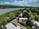 Aerial view displaying beautiful lakefront community near single-Gathering homes at 1769 S Lee St # B, Lakewood, CO 80232