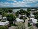 An aerial view features serene lake views near residential homes at 1769 S Lee St # B, Lakewood, CO 80232
