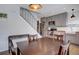 Modern kitchen with gray cabinets, stainless appliances, and an island sink at 1769 S Lee St # B, Lakewood, CO 80232