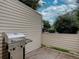 Cozy outdoor patio area with a grill and privacy fence, ideal for entertaining or relaxing at 1769 S Lee St # B, Lakewood, CO 80232