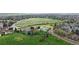 Expansive aerial view of the community featuring lush green spaces, parks, and recreation areas at 7682 S Steele St, Centennial, CO 80122