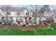 Private backyard with a wooden fence, patio area, and well-maintained lawn, perfect for outdoor enjoyment at 7682 S Steele St, Centennial, CO 80122