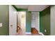 Basement featuring a view to stairs, open space, and organized closet at 7682 S Steele St, Centennial, CO 80122
