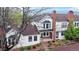 Well-maintained townhome boasts a brick exterior, mature landscaping, and inviting front entrance at 7682 S Steele St, Centennial, CO 80122