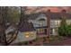 Charming townhome with a landscaped front yard, brick accents, and a welcoming entrance at 7682 S Steele St, Centennial, CO 80122