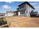 Backyard showing lawn prep and home exterior at 8585 Eckley St, Littleton, CO 80125