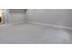Spacious carpeted basement with access to the bathroom at 8585 Eckley St, Littleton, CO 80125