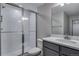 Bathroom features a tile shower and vanity at 8585 Eckley St, Littleton, CO 80125