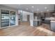 Open floor plan with combined living room and kitchen. Great for entertaining guests at 8585 Eckley St, Littleton, CO 80125