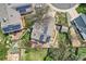 Bird's eye view of home with solar panels, manicured backyard, and brick path at 9125 W 95Th Ave, Westminster, CO 80021
