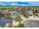 Beautiful aerial view of a neighborhood home with solar panels and mountain views in the background at 9125 W 95Th Ave, Westminster, CO 80021