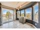 Inviting dining area with large windows and sliding glass door access to the deck at 9125 W 95Th Ave, Westminster, CO 80021