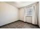 Sunny room featuring tile floors, and a large window with lots of natural light at 9125 W 95Th Ave, Westminster, CO 80021
