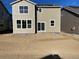 Two-story house featuring a neutral color scheme and backyard at 5528 Inland Ave, Firestone, CO 80504