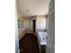 Well-lit bathroom boasting a soaking tub and double vanity for added convenience at 1148 S Duquesne Cir, Aurora, CO 80018