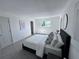 Spacious bedroom with a comfortable bed, ample natural light, and neutral colors at 4382 S Xenon St, Morrison, CO 80465