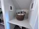 Neatly arranged closet with decorative pillows in a woven basket on a shelf at 4382 S Xenon St, Morrison, CO 80465