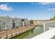 Aerial view of multi-story condos with docks and water access to the lake at 6840 Xavier Cir # 5, Westminster, CO 80030