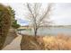 Backyard with a view of the lake and the bridge to the island at 6840 Xavier Cir # 5, Westminster, CO 80030