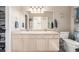 Bathroom featuring double sinks, a large mirror, and ample counter space at 6840 Xavier Cir # 5, Westminster, CO 80030