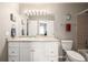 Neutral bathroom with long vanity, large mirror, and combo shower-tub at 6840 Xavier Cir # 5, Westminster, CO 80030