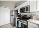 Well-equipped kitchen with stainless steel appliances and ample cabinet space at 6840 Xavier Cir # 5, Westminster, CO 80030