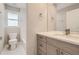 Modern bathroom with white tiling, stylish vanity, and sink with new fixtures at 2552 E 126Th Way, Thornton, CO 80241