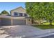 Charming two-story home boasts a well-manicured lawn, a three-car garage, and an inviting curb appeal at 2552 E 126Th Way, Thornton, CO 80241