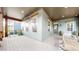 Spacious outdoor porch with modern furniture, offering a relaxing retreat with ample seating at 9437 E 51St Dr, Denver, CO 80238