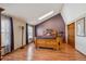 Spacious bedroom with vaulted ceiling, skylight and wood-look floors at 9938 Grove Way # B, Westminster, CO 80031