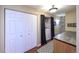 Laundry area equipped with washer, dryer and overhead cabinets at 8481 W Union Ave # 2-201, Littleton, CO 80123