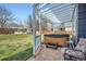 Backyard featuring a patio with a hot tub, a well-maintained lawn, and privacy fencing at 16442 Bluebonnet Dr, Parker, CO 80134