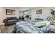 Spacious bedroom showcasing a comfortable sitting area and ample natural light for a relaxing retreat at 16442 Bluebonnet Dr, Parker, CO 80134