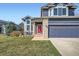 Charming home with a well-manicured lawn, and a three-car garage at 16442 Bluebonnet Dr, Parker, CO 80134