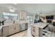 Modern kitchen featuring granite countertops, gray cabinets, and stainless steel appliances at 16442 Bluebonnet Dr, Parker, CO 80134
