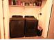 Convenient laundry room with a washer and dryer set, offering practicality in a compact space at 14353 E 1St Dr # 201, Aurora, CO 80011