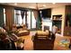 Bright living room boasts a fireplace and large windows at 14353 E 1St Dr # 201, Aurora, CO 80011