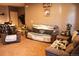 A bright living room featuring plush seating and lots of natural light at 14353 E 1St Dr # 201, Aurora, CO 80011
