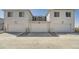 Exterior view of attached townhomes featuring three garages at 27742 E 1St Ave, Aurora, CO 80018