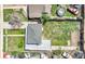 Aerial view of a property with a fenced yard and a trampoline at 6671 Grove St, Denver, CO 80221