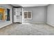 Spacious bedroom with built-in storage, carpet flooring, and neutral gray walls at 6671 Grove St, Denver, CO 80221