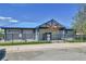 Commercial building featuring a blue roof and a well-maintained exterior at 6671 Grove St, Denver, CO 80221