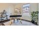 A bright office space with neutral paint, area rug, and natural light at 2562 N Emerson St, Denver, CO 80205