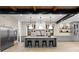 Beautiful kitchen with island, modern lighting, stainless steel appliances, and ample counter space at 1126 S Garfield St, Denver, CO 80210