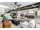 Open living space with modern staircase, kitchen view and comfortable seating at 1126 S Garfield St, Denver, CO 80210